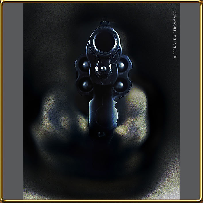 wielding a revolver
